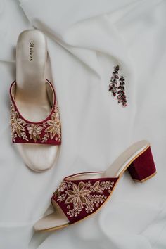 A beautiful and comfortable friend for your feet . The hand embroidered zardozi art is the perfect heels for you this wedding season. The insoles are made of soft foam to give you all day comfort. We can customise the heel as per your choice. Material : Velvet Heel in the picture: 2 inch block heel OutSole : Non slip TPR Color : Burgundy Traditional High Heel Festive Heels, Traditional Open Toe Wedding Heels, Traditional Closed Toe Heels For Reception, Traditional High Heels For Festive Occasions, Festive Open Toe Wedding Shoes, Traditional Block Heel Wedding Heels, Traditional Open Toe Heels For Festive Occasions, Festive High Heels For Wedding, Traditional Heels With Gota Work And Closed Toe