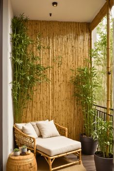 an outdoor patio with bamboo walls and plants on the floor, along with a chaise lounge