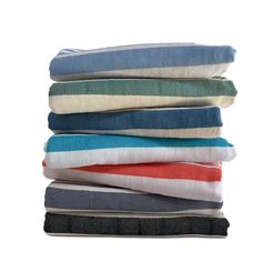 towels stacked on top of each other in different colors and patterns, all folded up