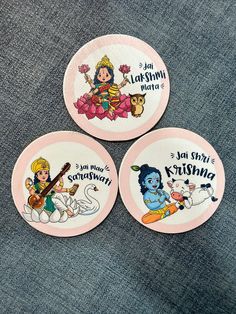 three plates with cartoon characters painted on them