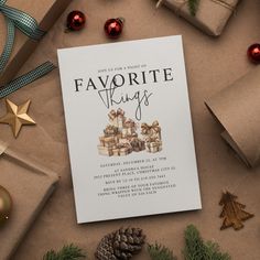 the front cover of favorite things magazine surrounded by presents and christmas tree decorations, including wrapped presents