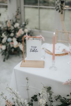 White acrylic wedding signage with black ink. Table numbers with pink chiffon ribbons. Calligraphy menus on Hammered Card, calligraphy place cards with gingham ribbons. Featured on Rock My Wedding. Signed By Charlotte, Hayne House, Emma Collyer photography, Louise Roots Florist, Nova Memories White Wedding Signage, Cottage Romance, Wedding Top Table, Calligraphy Place Cards, Table Signage, Card Calligraphy, Signage Signs, Calligraphy Stationery, Wedding Instagram