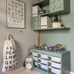 a child's playroom with legos on the shelves and toys in bins