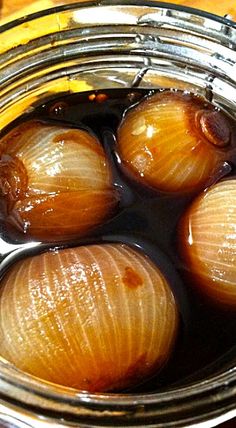 three onions are in the oil on top of each other