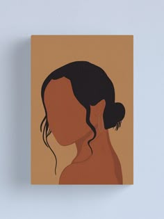 a woman's profile in brown and black on a tan background canvas mounted print