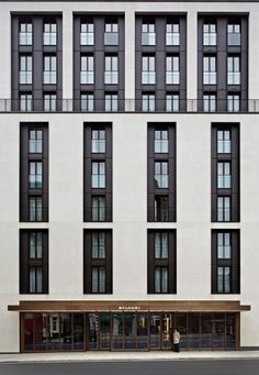 a large white building with many windows on it