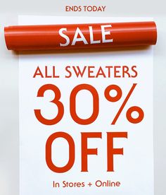 a red and white sign with the words sale all sweaters 30 % off in stores + online