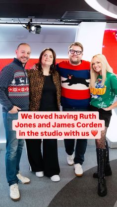 three people standing next to each other in front of a sign that says we loved having ruth jones and james corden in the studio with us