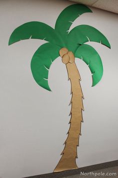 a palm tree cut out on the side of a wall