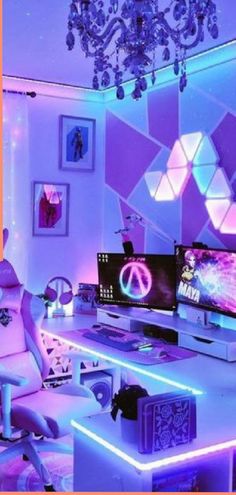 a living room with purple lighting and two computer monitors on top of a desk in front of a chandelier