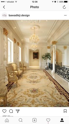 an ornate hallway with chandeliers and chairs in it's centerpieces