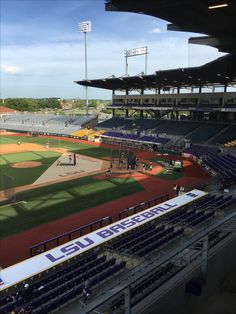 an empty baseball stadium filled with lots of people