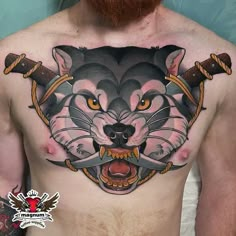 a man's chest with an image of a wolf and two swords on it