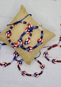 Surprise your favorite boricua with a gorgeous, adjustable Puerto Rican seed bead bracelet! Perfect for everyday wear, or for a special occasion. These bracelets are lightweight, yet sturdy and durable. The nylon cord is strong and durable. Wear it to a parade or just hang it on your mirror for a quick reminder that you're proud. Bracelets are made with seed beads and/or crackle beads, polymer clay beads, and nylon cord. Although bracelets look similar, they are all unique. Ready to ship. Patriotic Handmade Adjustable Bracelets, Handmade Adjustable Patriotic Bracelets, Handmade Adjustable Patriotic Bracelet, Adjustable Patriotic Friendship Bracelets As Gifts, Patriotic Adjustable Colorful Beads Jewelry, Adjustable Patriotic Jewelry With Colorful Beads, Adjustable Patriotic Stretch Bracelet Gift, Beads Polymer Clay, Diy Jewelry Unique