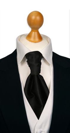 Introducing our black satin cravat, the epitome of classic clean look for party wear. Crafted with exquisite silk, this cravat showcases a deep black color that exudes sophistication and timeless style. Its sleek and smooth texture provides a luxurious feel, making it a perfect accessory for formal events, weddings, or any occasion that calls for a touch of elegance. Elegant Standard Tie For Wedding, Elegant Black Wedding Tuxedo, Classic Solid Neckwear For Wedding, Classic Fitted Neckwear For Semi-formal Occasions, Classic Fitted Semi-formal Neckwear, Classic Solid Color Neckwear For Weddings, Elegant Solid Color Neckwear For Weddings, Classic Solid Color Wedding Neckwear, Elegant Neckwear For Wedding