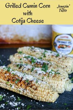 grilled corn on the cob with cottage cheese and parmesan sprinkles