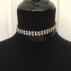 Ribbon And Crystal Choker Necklace. 3 Rows Of Crystal Stones In The Center Of A Ribbon. Can Be Worn Multiple Ways. Rhinestones Measure 9 Inches, Total Length Of Necklace Is 71 Inches. New. Smoke/Pet Free Home. Party Black Choker With Rhinestones, Black Rhinestone Party Choker, Party Black Rhinestone Choker, Adjustable Black Rhinestone Necklace For Party, Elegant Adjustable Black Rhinestone Necklace, Elegant Black Adjustable Rhinestone Necklace, Elegant Black Choker With Rhinestones, Elegant Black Rhinestone Choker, Gold Elegant Choker For Night Out