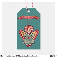 a christmas gift tag with an angel on it