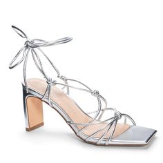 Be a showstopper in this Yita Metallic Silver Sandal! Get ready for the night with the silver and metallic shine – perfect for a formal event or night out. Featuring tie straps so you can adjust the fit and show off your style. Get the attention you deserve! 🤩 Roman Fashion, Silver Sandals, Metallic Sandals, Chinese Laundry, Lace Up Heels, Dress Sandals, Party Shoes, Strappy Heels, Leather Material