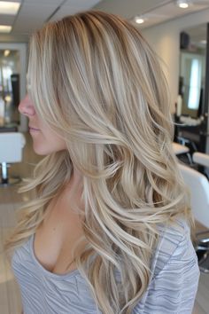 Get inspired by these elegant blond hair color ideas that enhance natural beauty and add sophisticated flair. Blonde Winter Highlights, Multi Tone Hair Color Blonde, Blonde Highlights Hair Color Ideas, Creamy Blonde Hair With Lowlights, Blonde Hair Over 50 Older Women, Butter Blonde Hair, Blonde Light Brown Hair, Caramel Blonde Hair