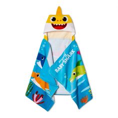 a towel with a shark on it and an undershirt that says baby shark