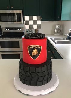 a cake made to look like a motorcycle tire on top of a kitchen countertop