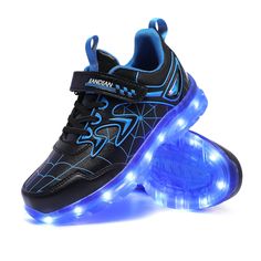 a pair of black and blue shoes with lights on the soles, one shoe is glowing