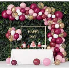 a birthday party with balloons and cake