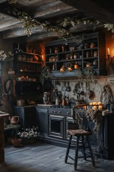 an old fashioned kitchen with lots of pots and pans