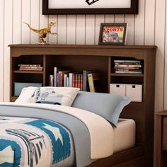 a bed with a book shelf above it