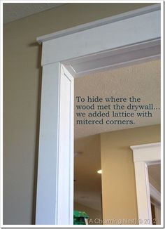 a white framed mirror with a quote on the wall above it that says, to hide where the wood met the drywall we added lattice with material