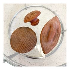 three different types of nuts in a glass bowl