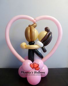 a couple in love holding each other on top of a heart shaped balloon with the caption phenix's balloons