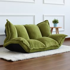 a couch that is sitting on top of a rug