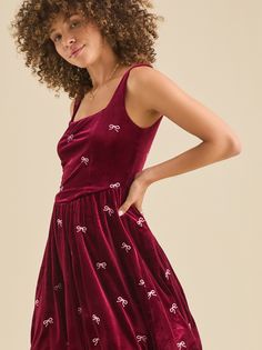 This velvet mini bubble dress features a playful embroidered bow detail. Perfect for adding a touch of feminine charm to your outfit. Embroidered Bow, Daisy Dress, Swimwear Trends, Bubble Dress, Anna Sui, Vintage Velvet, Altar'd State, Shop Maxi Dresses, Christmas Dress