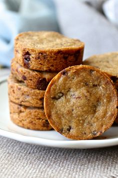 a stack of cookies sitting on top of a white plate