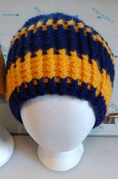 Adult size hat - hand crochet by me. West Virginia University colors Yellow Yarn Crochet Cap, Yellow Crochet Cap Hat, Yellow Yarn Crochet Hat, Yellow Crochet Yarn Cap, Hand Knitted Yellow Crochet Hat, Handmade Yellow Crochet Hat For Winter, Yellow Yarn Crochet Beanie Hat, Yellow Hand Knitted Beanie Crochet Hat, Yellow One-size Crochet Cap