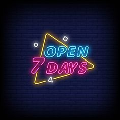 an open 7 days neon sign on a brick wall