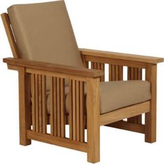 a wooden chair with a tan cushion on it