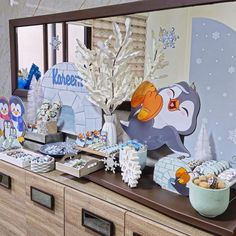 an image of a penguin themed dessert table