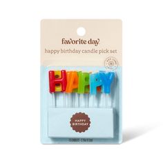 the happy birthday candles are in plastic packaging