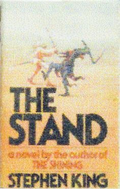 the stand by stephen king is shown in front of a blurry background with two people on skis