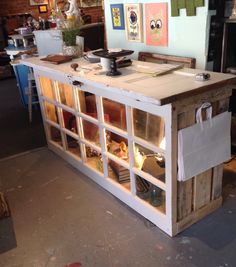 a kitchen island made out of an old window