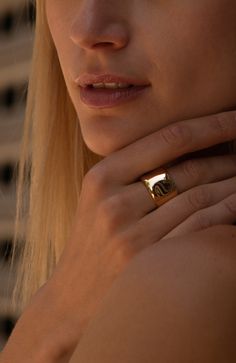 The striking bold simplicity of the Ripple Band Ring is perfect when worn solo or stack it up. Handcast using traditional artisan techniques in Kenya. Gold products are 24k gold plated brass and match our brass style in color and tone. Your purchase promotes artisan innovation + entrepreneurship. This product runs small, we recommend sizing up. Dimensions: Total height; 0.55in (14mm) Thickness; 0.08in (2mm) Innovation And Entrepreneurship, Carbon Offset, Your Values, Gold Band Ring, Michelle Obama, Stunning Jewellery, Band Ring, Kenya, Band Rings