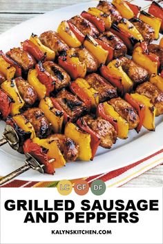 grilled sausage and peppers on a plate with text overlay that says grilled sausage and peppers