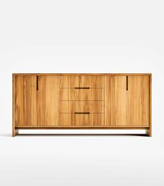 the sideboard is made out of wood and has two drawers on each side, one with