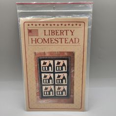 a box with an american flag on the front and side of it that says liberty homestead