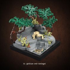 an image of a lego model of some animals in the wild with trees and rocks