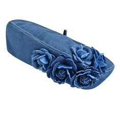 a denim hat with blue flowers on it