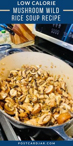 a pan filled with mushrooms sitting on top of a stove